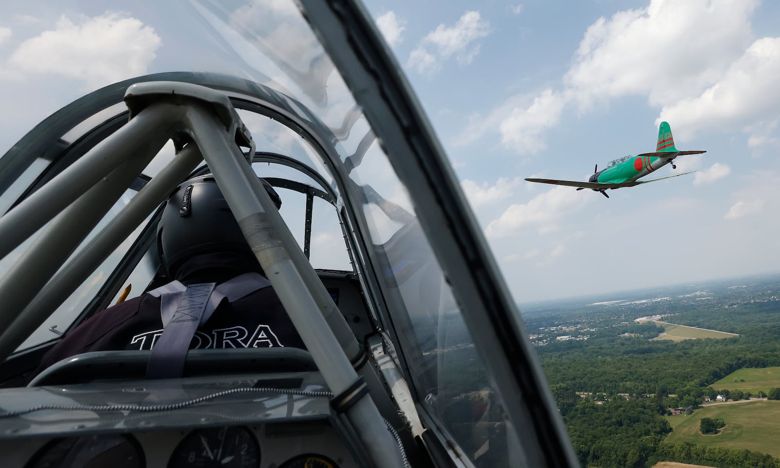 The flight team Tora Tora Tora, a frequent Dayton Air Show participant, flies Friday June 21, 2024 in preparation for the 50th Air Show, which is June 22-23. MARSHALL GORBY / STAFF