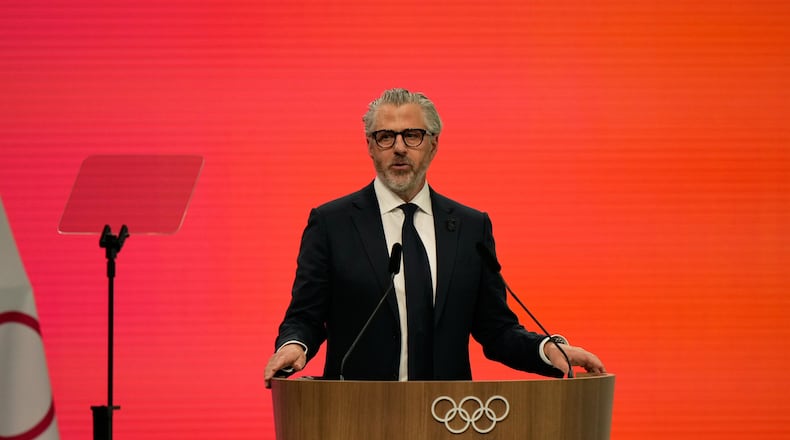 FILE - Casey Wasserman, Chairman of the Los Angeles Organizing Committee for the 2028 Olympic and Paralympic Games speaks during an IOC meeting ahead of the 2026 Winter Olympics, in Milan, Italy, Tuesday, Feb. 3, 2026. (AP Photo/Luca Bruno, File)