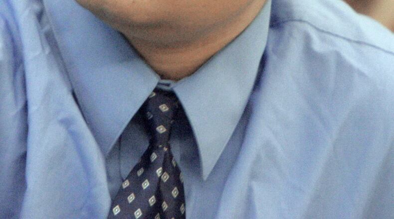 In this April 18, 2007 file photo, Adam Saleh listens to opening statements in his trial on aggravated murder in the death of Julie Popovich.