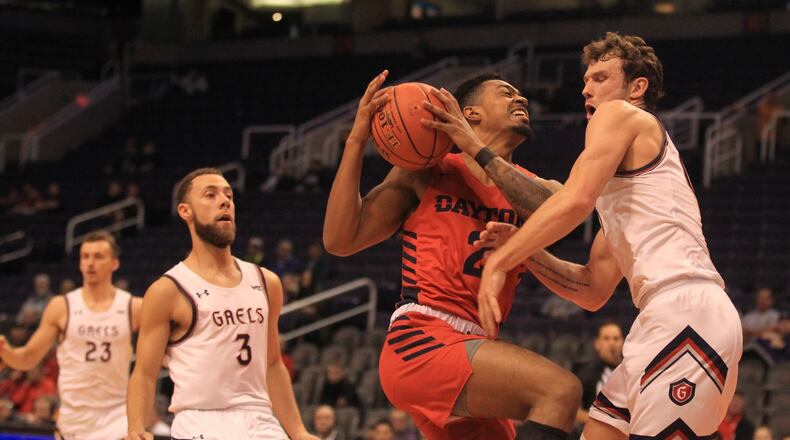Dayton’s Ibi Watson drives to the basket against Saint Mary’s on Sunday, Dec. 8, 2019, at Talking Stick Resort Arena in Phoenix, Ariz. David Jablonski/Staff