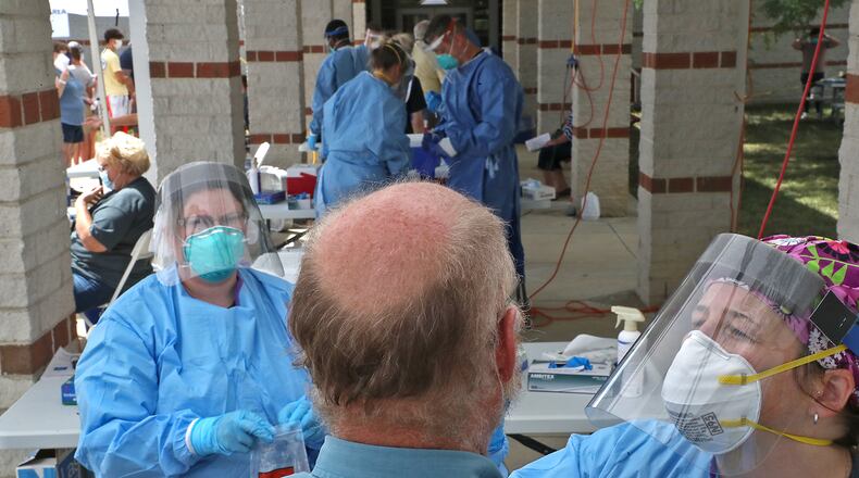 The Clark County Combined Health District held a free COVID-19 testing clinic Wednesday at Perrin Woods Elementary. BILL LACKEY/STAFF