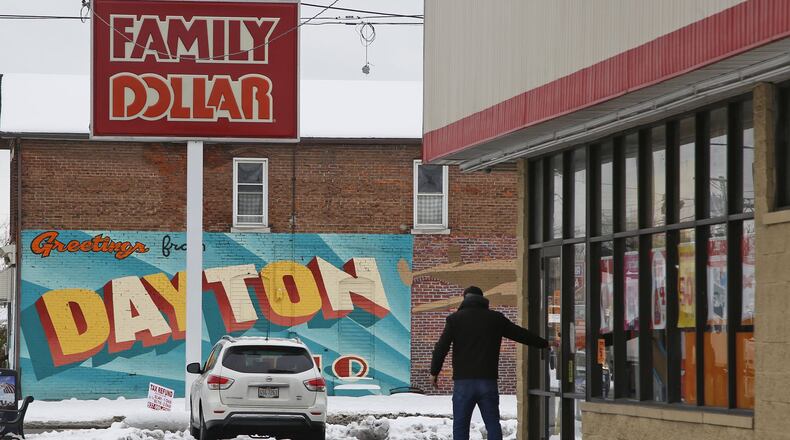 A Family Dollar is shown on East Fifth Street in Dayton. Thousands of people shop at the 69 Dollar General, Dollar Tree and Family Dollar stores within 10 miles of downtown Dayton. TY GREENLEES / STAFF