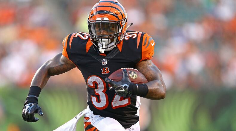 CINCINNATI, OH - AUGUST 28:  Jeremy Hill #32 of the Cincinnati Bengals runs with the ball during the second quarter against the Indianapolis Colts at Paul Brown Stadium on August 28, 2014 in Cincinnati, Ohio. (Photo by Andy Lyons/Getty Images)