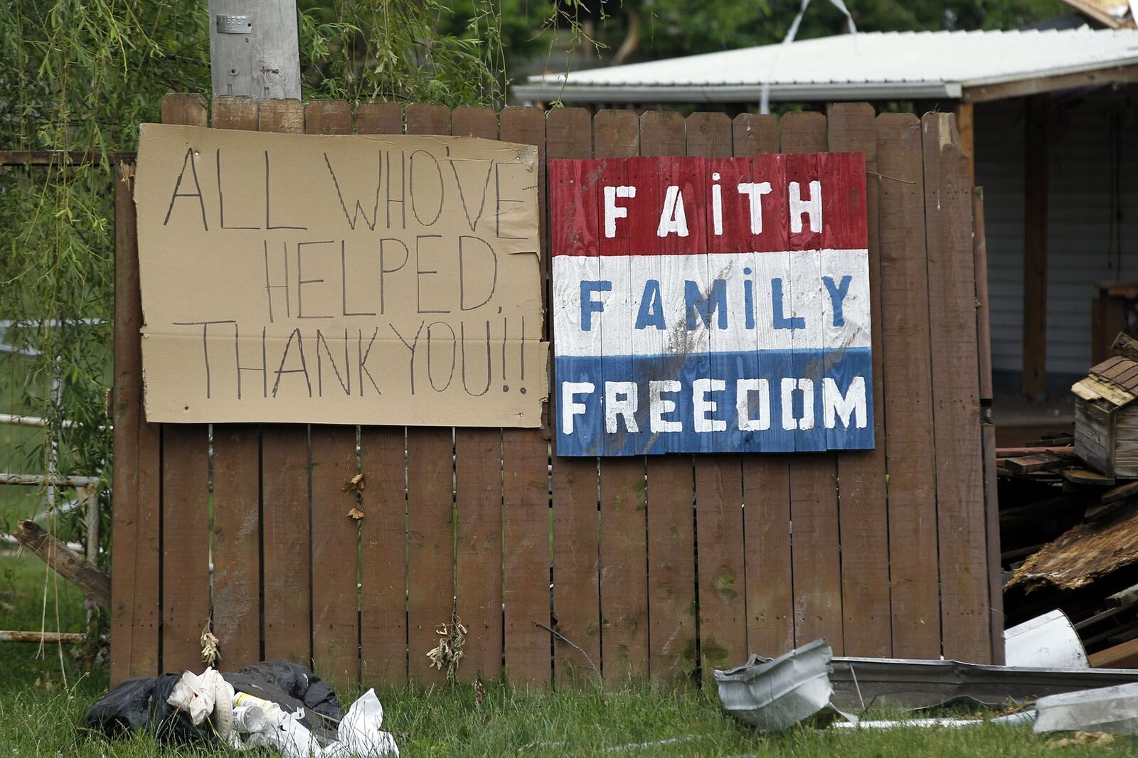 A sign along Woodhaven Avenue in Harrison Twp. after the Memorial Day tornadoes thanks the thousands of volunteers who helped in the recovery effort. TY GREENLEES / STAFF