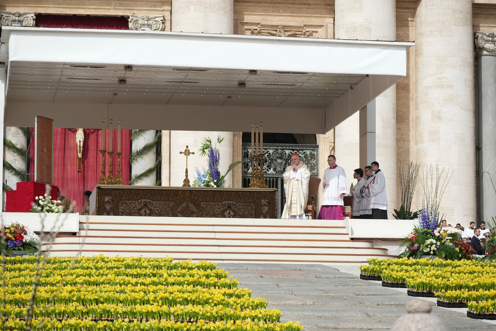 Cardinal Angelo Comastri presides over the Easter mass in St. Peter's Square at the Vatican Sunday, April 20, 2025. (AP Photo/Andrew Medichini)