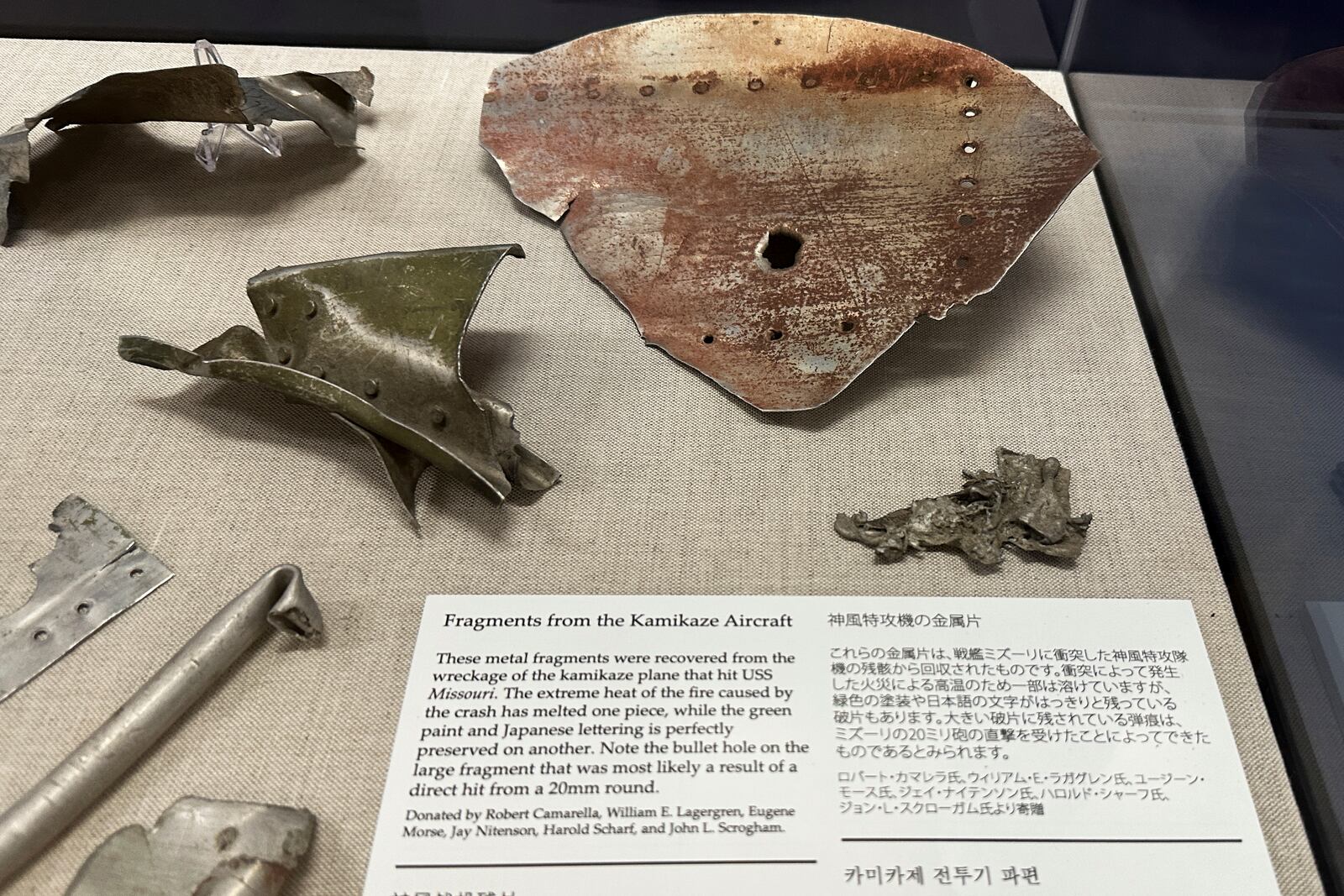 This April 3, 2025, photo taken at the Battleship Missouri Memorial in Pearl Harbor, Hawaii, shows fragments of the Japanese Zero fighter that a kamikaze pilot flew into the side of the USS Missouri during the Battle of Okinawa on April 11, 1945. (AP Photo/Audrey McAvoy)