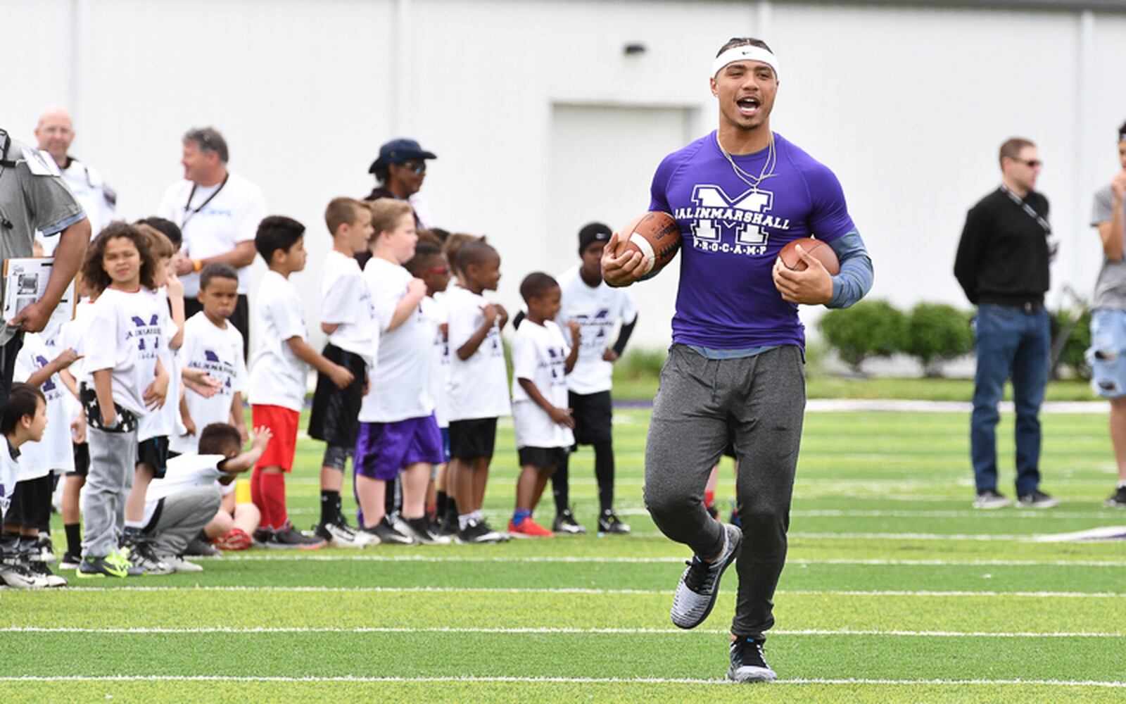 Former Middletown star and current New York Jet receiver Jalin Marshall runs during a camp for elementary and middle school students on Sunday afternoon at Barnitz Stadium. Contributed Photo by Bryant Billing