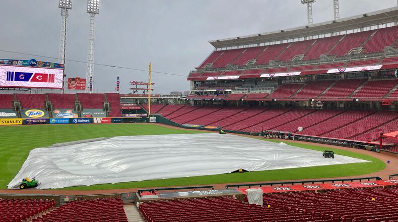 Rain falls at Great American Ball on Thursday, July 30, 2020, in Cincinnati. A game between the Reds and Cubs was postponed by rain.David Jablonski/Staff
