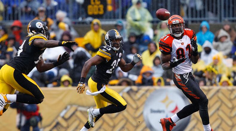 Former Bengals wide receiver Terell Owens catches a pass in front of Steelers defensive back Ryan Clark during a game on December 12, 2010 at Heinz Field in Pittsburgh. Owens once played in the Hall of Fame game for Cincinnati.