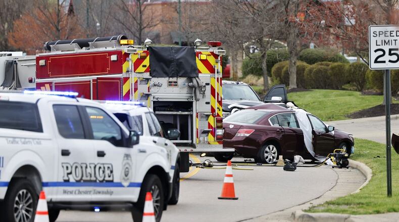 At least one person was killed Tuesday afternoon, April 12, 2022, in front of AMC movie theater on Civic Centre Boulevard in West Chester Twp.  NICK GRAHAM / STAFF