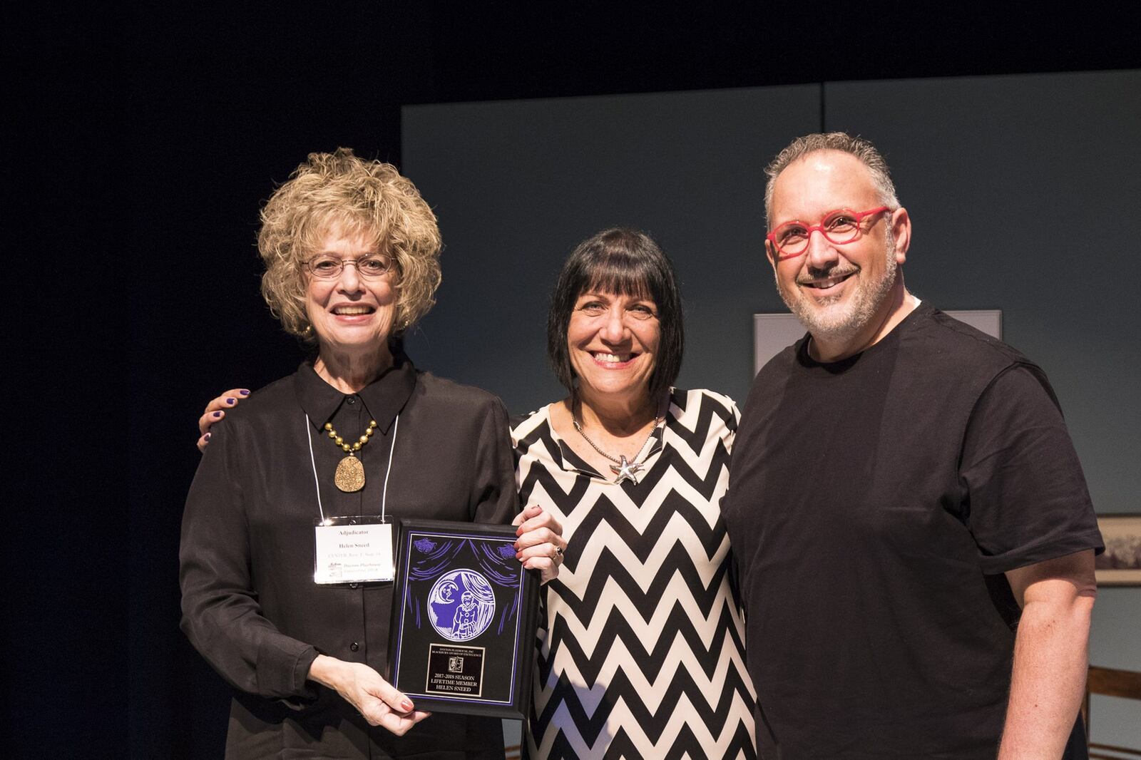 The Dayton Playhouse surprised Helen Sneed of Austin, Texas, with a Lifetime Achievement Award at this year’s FutureFest. She has been an adjudicator for the new play festival for the past 25 years. She’s pictured here with festival co-chairs Tina McPhearson and Brian Sharp. CONTRIBUTED/ART FABIAN