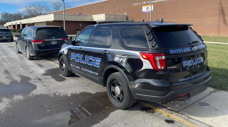Police cruiser outside John E. Smith Intermediate School after a misunderstanding and a box of doughnuts led to the Dayton Bomb Squad responding to the school. JIM NOELKER, STAFF