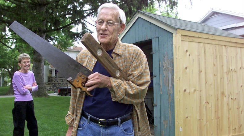 Bob Batz, a former Dayton Daily News reporter, died Friday, Dec. 16, 2016. In this file photo, Batz undertook the project of refurbishing the century old former smokehouse instead of buy a new Home Depot variety. FILE
