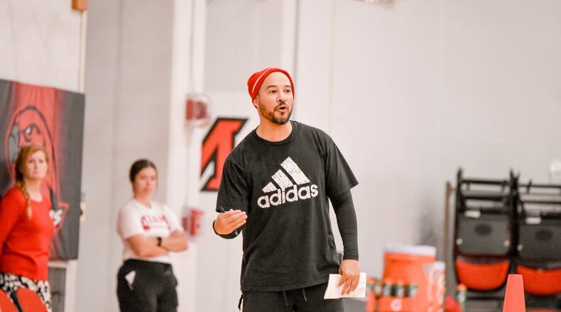 Miami women's basketball coach Glenn Box works with his team during a recent summer drills session. Miami University Athletics photo