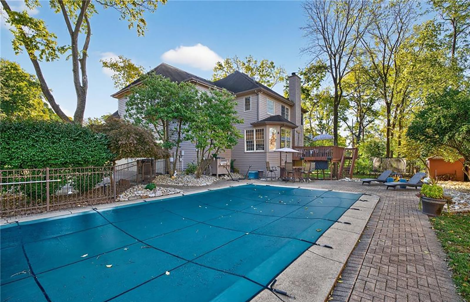 The two story in Sycamore Trails features an inground pool surrounded by pavers, a raised deck, a covered deck and an extended patio. CONTRIBUTED