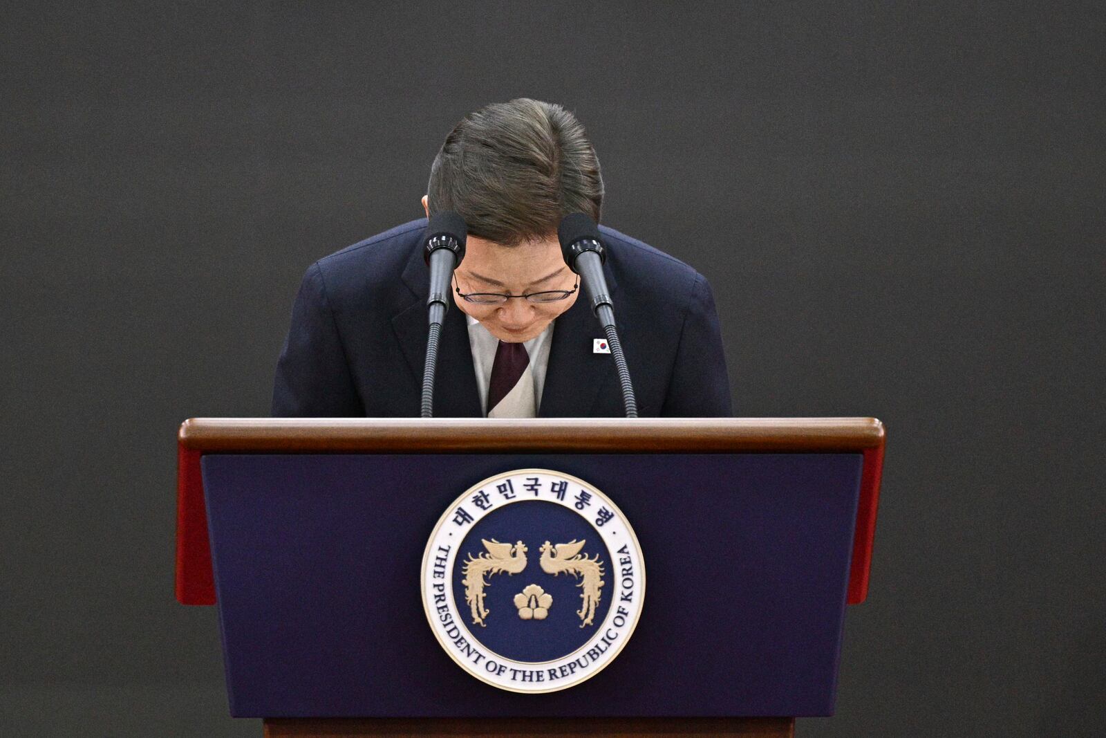 South Korea's President Lee Jae-myung bows as he delivers a speech after taking his oath during his inauguration ceremony at the National Assembly in Seoul on June 4, 2025. (Anthony Wallace/Pool Photo via AP)