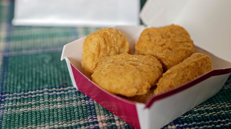 FILE - In this March 4, 2015, file photo, an order of McDonald's Chicken McNuggets is displayed for a photo in Olmsted Falls, Ohio. (AP Photo/Mark Duncan, File)