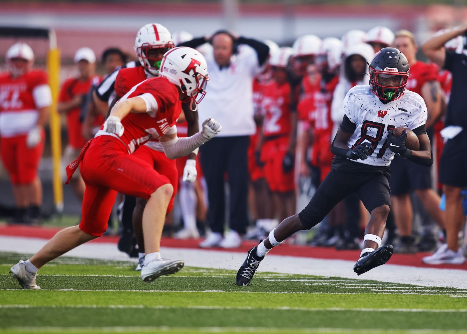 Lakota West's Labron Lumpkins carries the ball during their football game against Fairfield Friday, Sept. 19, 2025 in Fairfield. The Indians won 10-7. NICK GRAHAM/STAFF
