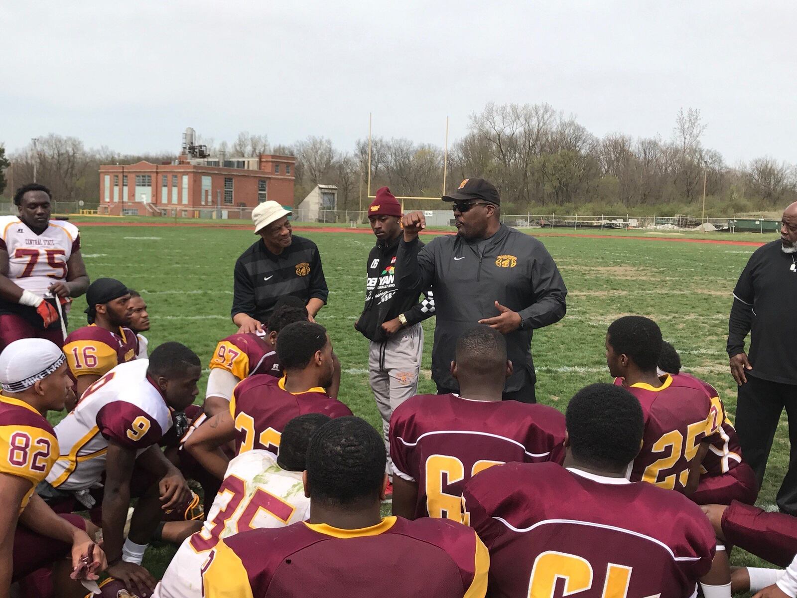 Wide receivers coach George Ragsdale (left), student assistant Lavon Meeks and head coach Cedric Pearl (right) talking to CSU team after Spring Showcase Saturday at McPherson Stadium. Tom Archdeacon/STAFF