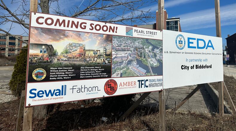 Schematics for an affordable housing project are posted Tuesday, March 17, 2026, in Biddeford, Maine. (AP Photo/Patrick Whittle)