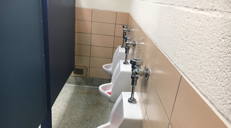 Kettering schools are adding partitions within boys bathrooms that separate the sinks and stalls area from the area with a row of urinals. District officials say the move is to increase student privacy, and it comes on the heels of 2016’s national debate over transgender bathroom usage. JEREMY P. KELLEY / STAFF