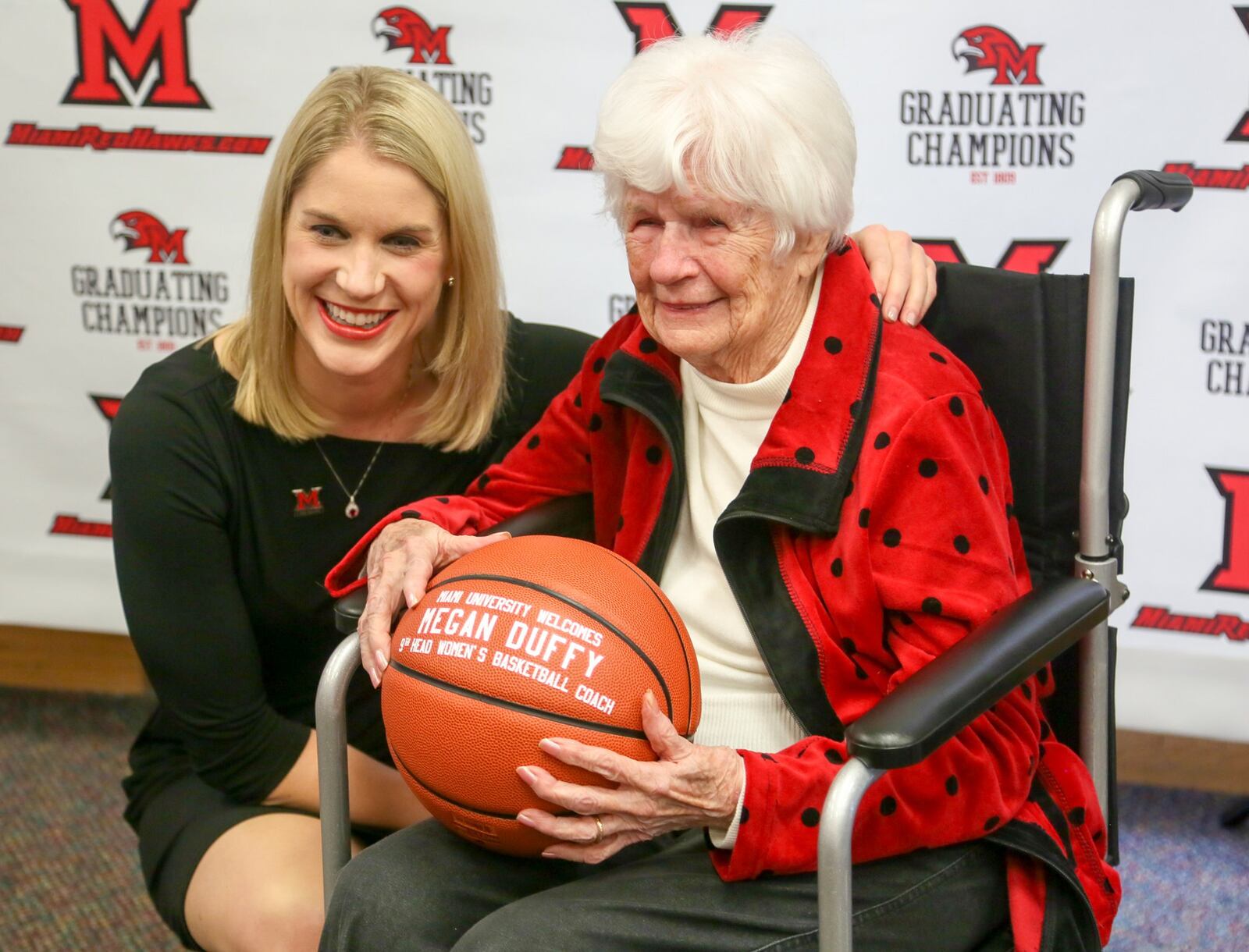 Megan Duffy, with her 95-year-old grandmother Marty Duffy, was introduced as new Miami women’s basketball coach during a ceremony at the Walter L. Gross Jr. Family Student-Athlete Development Center on campus, Tuesday, Apr. 4, 2017. GREG LYNCH / STAFF