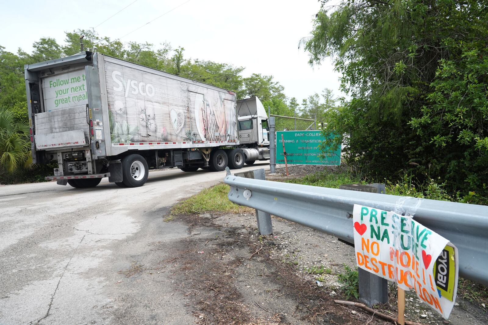 A Sysco truck arrives at the "Alligator Alcatraz," a new migrant detention facility at the Dade-Collier Training and Transition facility, Wednesday, July 2, 2025, in Ochopee, Fla. (AP Photo/Marta Lavandier)