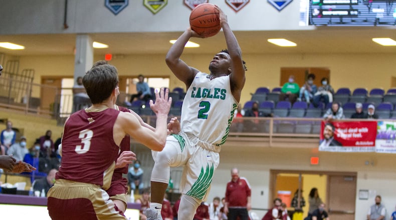 Chaminade Julienne's AJ Solomon shoots during the Eagles' regional final victory Saturday at Butler High School.  Jeff Gilbert/CONTRIBUTED