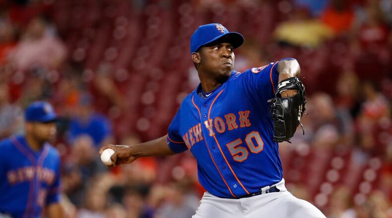 New York Mets starting pitcher Rafael Montero throws in the ninth inning of the team’s baseball game against the Cincinnati Reds, Wednesday, Aug. 30, 2017, in Cincinnati. The Mets won 2-0. (AP Photo/John Minchillo)