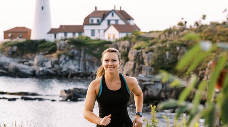 Katie Spotz running during another challenge. Spotz will be running 11 ultra-marathons in 11 days to set a Guinness world record. She will be running the length of Ohio. CONTRIBUTED