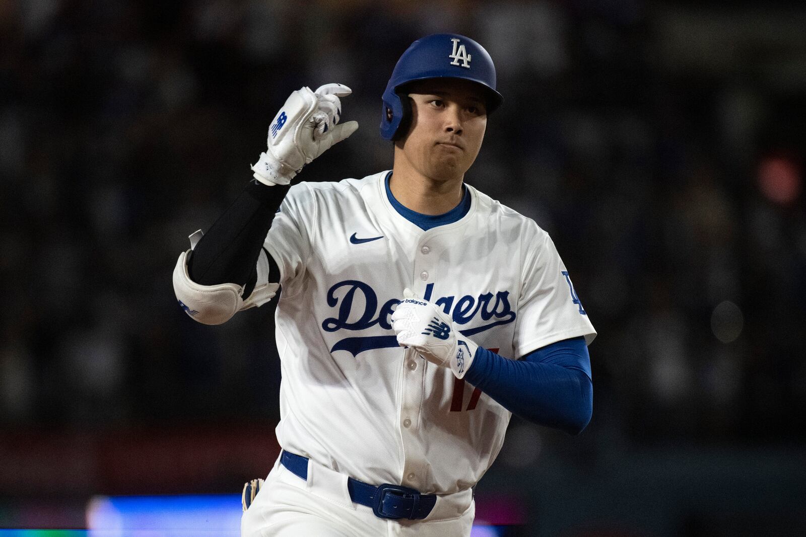 Los Angeles Dodgers' Shohei Ohtani celebrates his solo home run during the sixth inning of a baseball game against the Arizona Diamondbacks in Los Angeles, Monday, May 19, 2025. (AP Photo/Kyusung Gong)