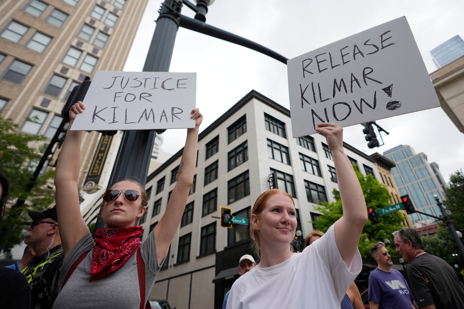 Natalie Schilling, Sydney Blocker gather outside the Federal Courthouse before arguments whether Kilmar Abrego Garcia can be released from jail on Friday, June 13, 2025 in Nashville, Tenn. (AP Photo/George Walker IV)