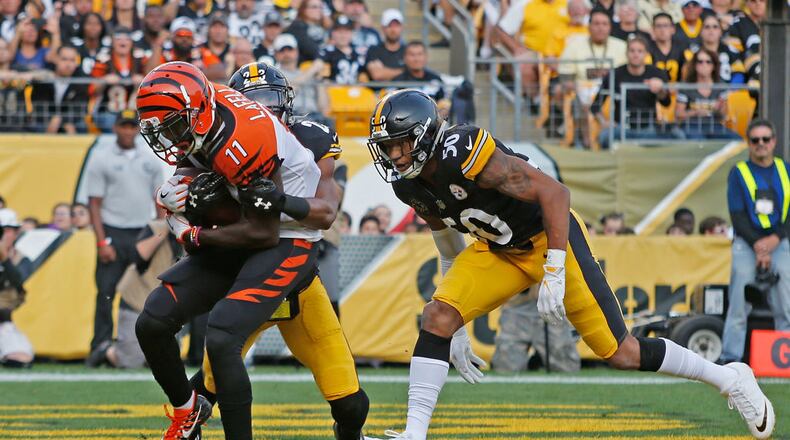 PITTSBURGH, PA - OCTOBER 22: Brandon LaFell #11 of the Cincinnati Bengals catches a pass from Andy Dalton #14 for a 6 yard touchdown reception in the first quarter during the game against the Pittsburgh Steelers at Heinz Field on October 22, 2017 in Pittsburgh, Pennsylvania. (Photo by Justin K. Aller/Getty Images)