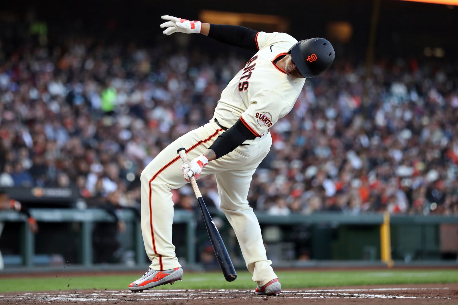 San Francisco Giants' Rafael Devers backs away from an inside pitch before walking in 4th inning against Cleveland Guardians during MLB game at Oracle Park in San Francisco on Wednesday, June 18, 2025. (Scott Strazzante/San Francisco Chronicle via AP)