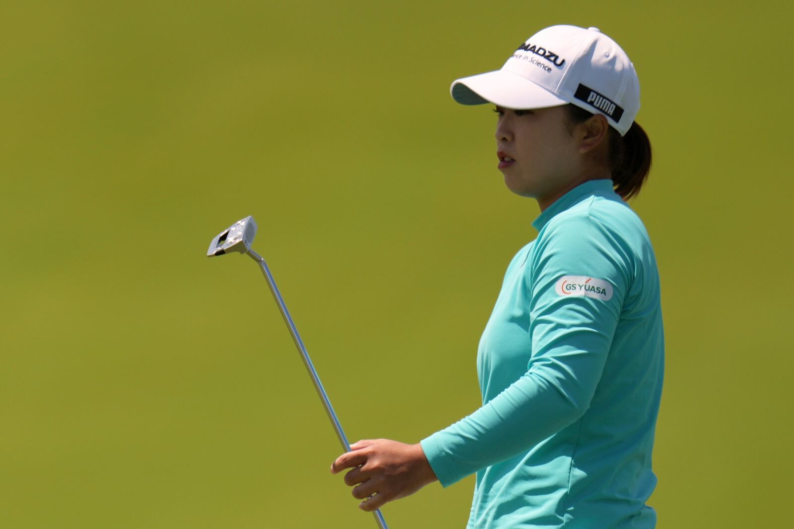 Mao Saigo, of Japan, reacts to missed putt on the fifth hole during the third round of the U.S. Women's Open golf tournament at Erin Hills Saturday, May 31, 2025, in Erin, Wis. (AP Photo/Jeff Roberson)