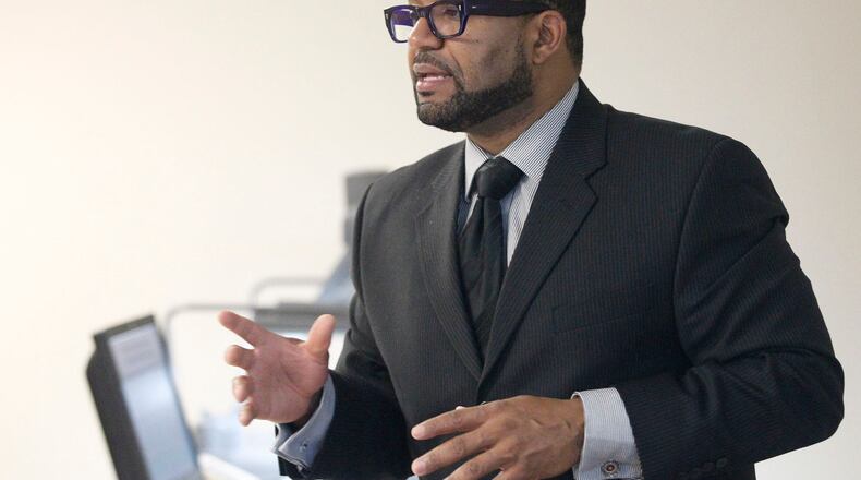 Derek E. Allen teaches about the hospitality industry and tourism at Sinclair Community College which offers a new hospitality services specialist short-term certificate.