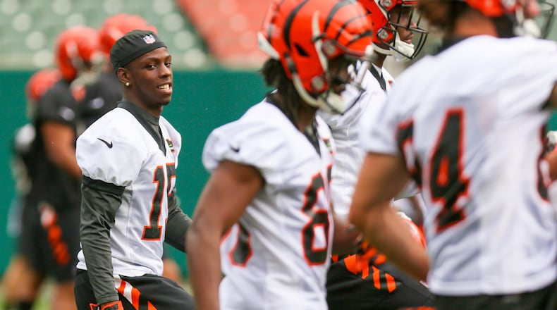 Bengals wide receiver John Ross (15) goes through stetching at minicamp practice at Paul Brown Stadium, Tuesday, June 13, 2017. GREG LYNCH / STAFF