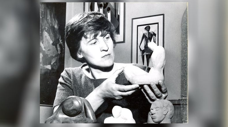 Local artist Aka Bohumyla Pereyma works on sculptures. CONTRIBUTED PHOTO