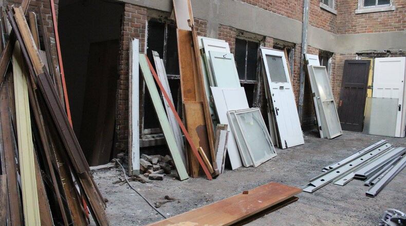 Kingswell Seminary, located on Central Avenue in Middletown, held a ribbon-cutting last week to celebrate its grand opening. The former Castell Building was purchased by Scott and Jeri Lewis in 2008, and in the 11 years since, they have renovated the five-story building. The building houses West Central Wine, Dons Pizza that is scheduled to open this month, offices Jeri Lewis uses for parades and Family Movie Nights, and a theological library. Office space is available on the third floor. The Lewises own Triad Investment Group. The building was constructed in 1915 by the Sebalds and took the name Castell because of the drug store on the corner. The building had dentist and doctor offices on the upper floor. submitted