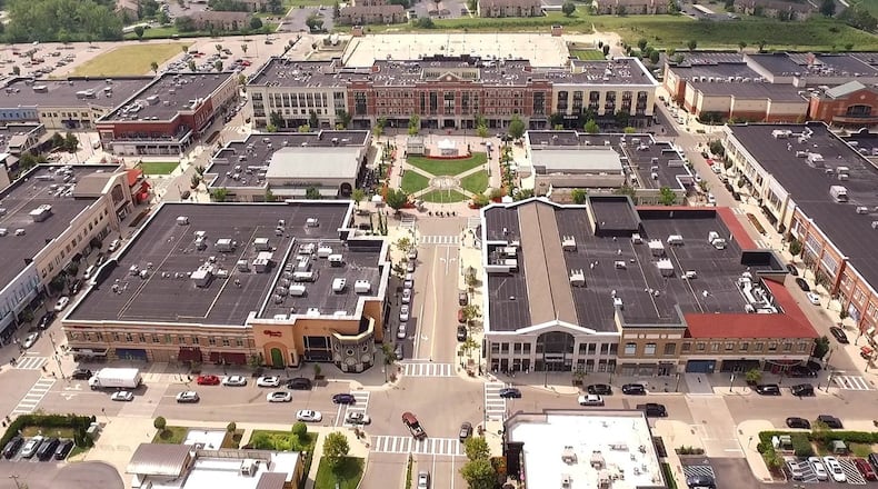 The Greene Town Center in Beavercreek opened in 2006 and is now boasting more than 100 shops and restaurants in the mixed retail open shopping center. TY GREENLEES / STAFF
