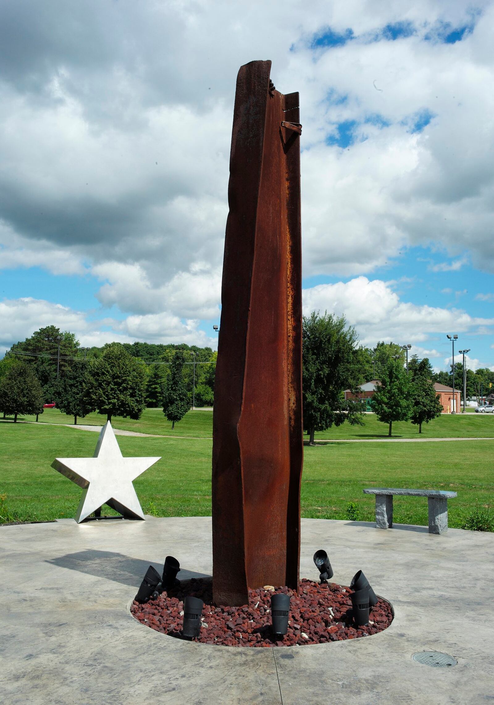 A burnt and twisted beam stands as a monument to 9/11 at Freedom Grove in Urbana. BILL LACKEY / STAFF