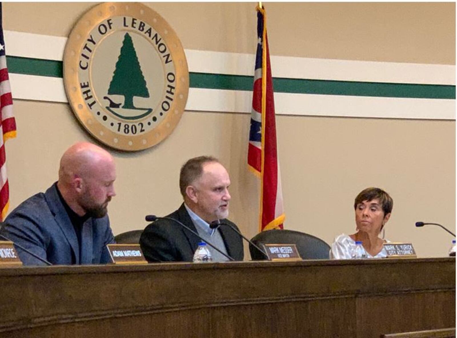 Mayor Amy Brewer, right, listens to comments from City Attorney Mark Yurick, center during Tuesday's Lebanon City Council meeting. At left is Vice Mayor Mark Messer. Brewer presided over her final council meeting Tuesday, ending a 32-year career in public office. ED RICHTER/STAFF
