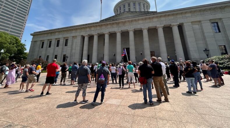 A group of over a hundred gathered outside the Statehouse Wednesday, June 21, 2023, to protest the Senate’s proposed operating budget, which the group contends does not supply adequate funding to a wide array of public services that Ohioans depend on.