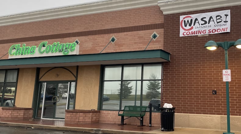 A new restaurant is preparing to open for business in the Springboro shopping center anchored by Dorothy Lane Market. NICK BLIZZARD/STAFF