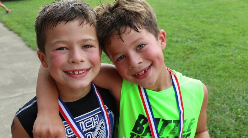 Twins Max and Josh Harker last year at the Lebanon Countryside YMCA triathlon. This year will be their fourth year participating. CONTRIBUTED