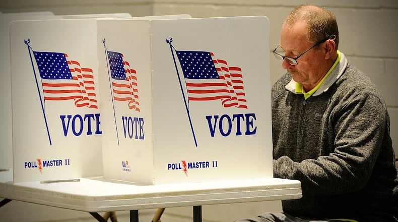 James Campbell, was one of the first voters to show up at the Huber Heights Church of God Tuesday, May 2, 2023. MARSHALL GORBY \STAFF