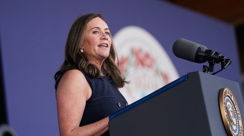 FILE - Dorothy McAuliffe speaks during a campaign event for her husband Virginia democratic gubernatorial candidate Terry McAuliffe at Lubber Run Park, July 23, 2021, in Arlington, Va. (AP Photo/Andrew Harnik, File)