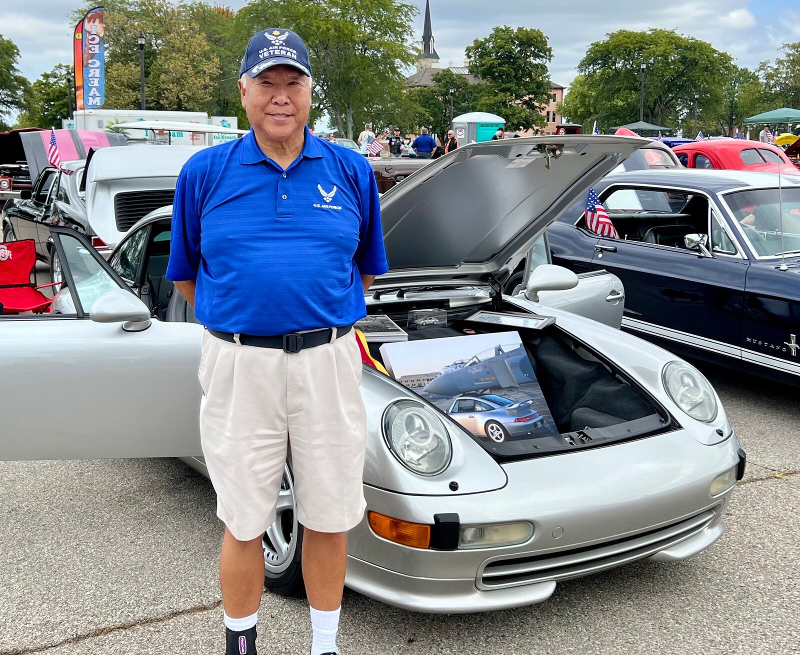 Walter Chin with his 1997 Porsche Targa at Saturday's Patriot Salute event on the Dayton VA Medical Center campus. AIMEE HANCOCK/STAFF