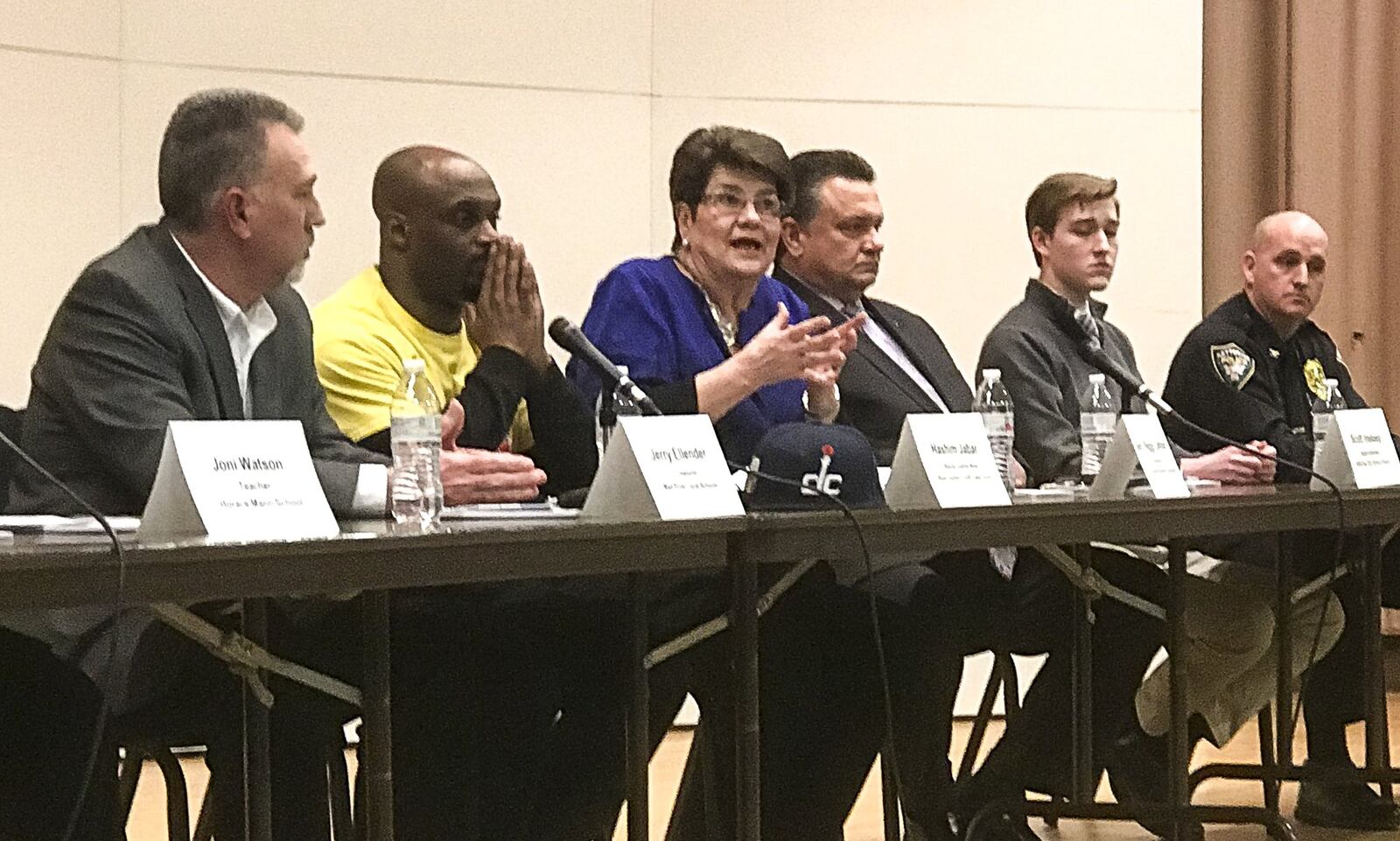 As a state Sen. Peggy Lehner, third from left, co-sponsored a bill requiring schools to notify parents within two hours if a child doesn’t show up for school. BEN McLAUGHLIN / STAFF