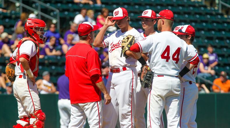 Lakota West pitcher Jacob Kates gets a visit to the mound during the first inning of their Division I state semifinal against Massillon Jackson at Huntington Park in Columbus on June 2, 2017. GREG LYNCH/STAFF